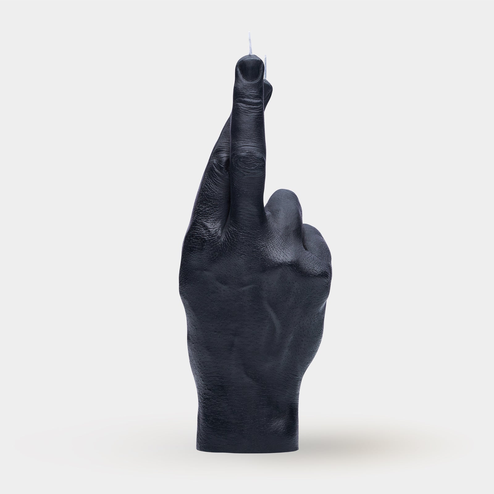Crossed Fingers candle hand